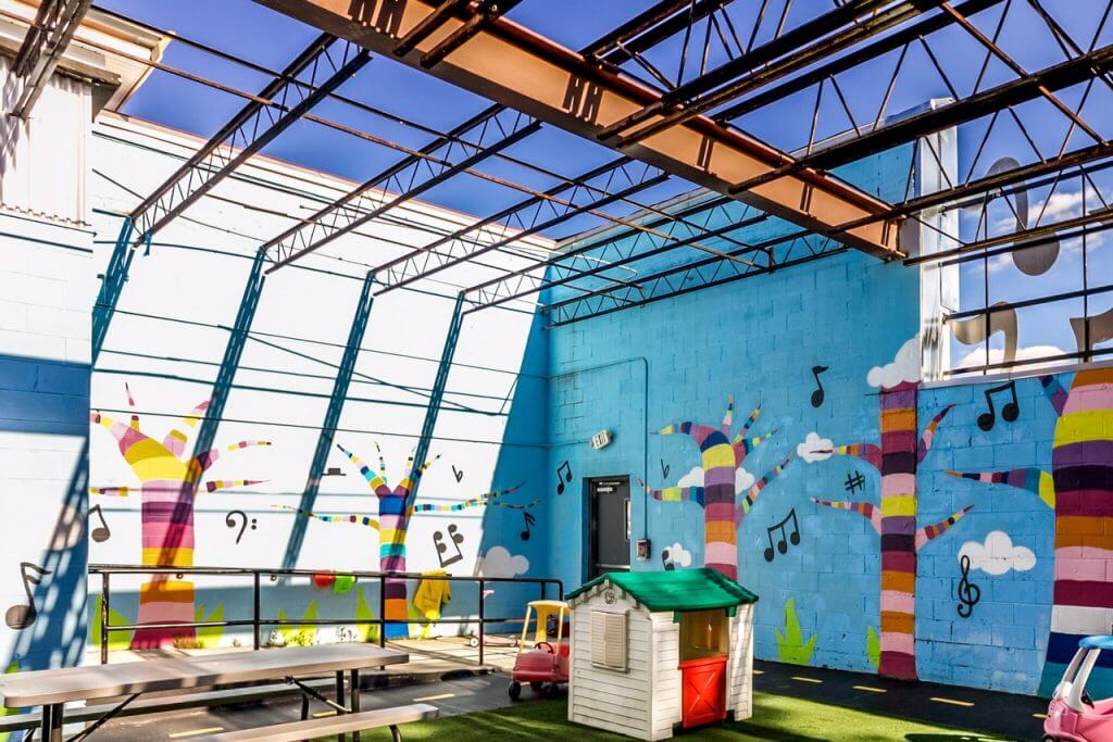Colorful play area with murals