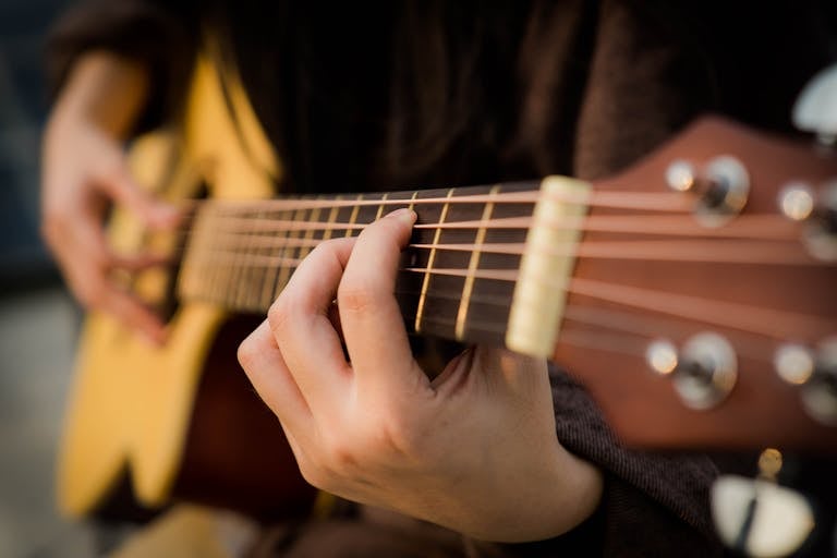 Guitar in a Music-enRiched preschool in owings mills