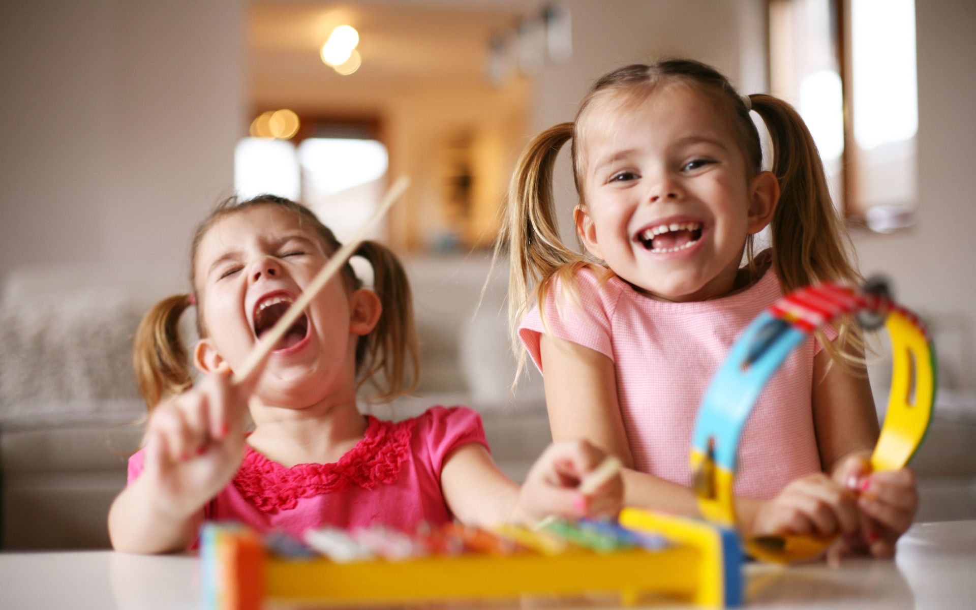 2 preschool girl Language development through music
